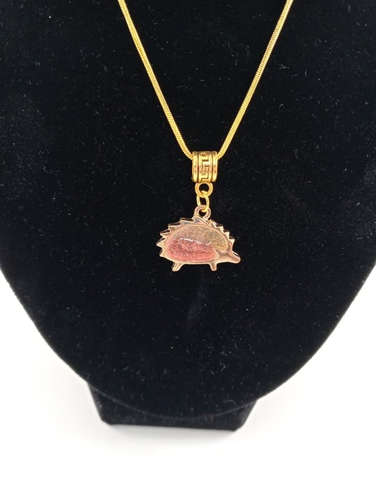 Seymour Sparkles pink and gold hedgehog necklace