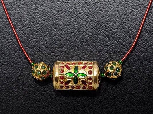Ruby and Emerald Jadau Lac pendant necklace