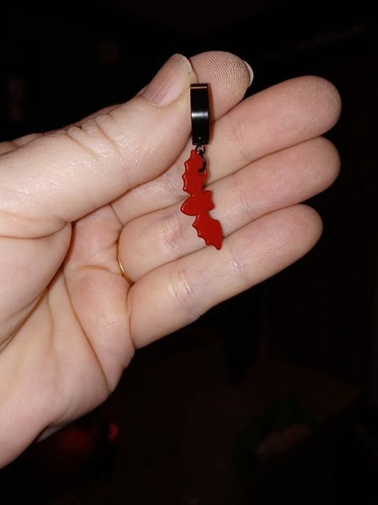Red and black bat huggy earrings