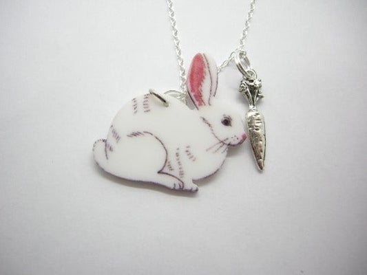 Laser-cut acrylic bunny pendant necklace with silver carrot charm