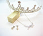 Bright chrome silver tiara with diamond-white cubic zirconia gems
