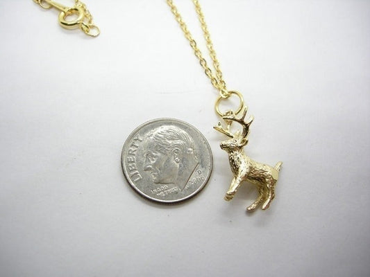 Tiny Shinies - golden reindeer pendant